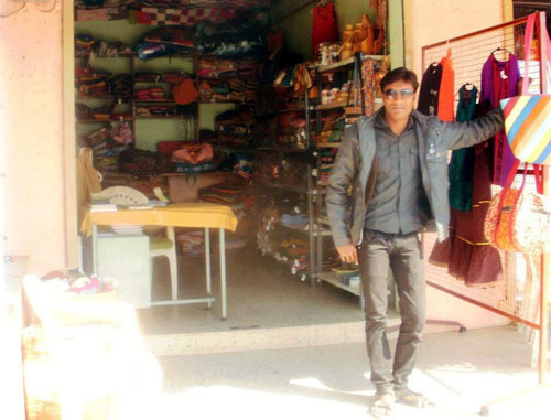 Kiran, sales clerk at Prithvi store in Arangaon village, India