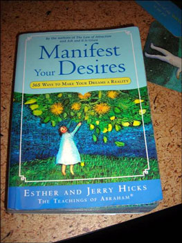 close-up of Jim's book, MANIFEST YOUR DESIRES, without glare.