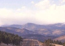 mountains rising beyond I-70, Genesee, CO